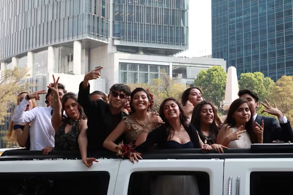 Happy customers enjoying luxury limousine service from www.transportlinkhub.pro during a memorable event.