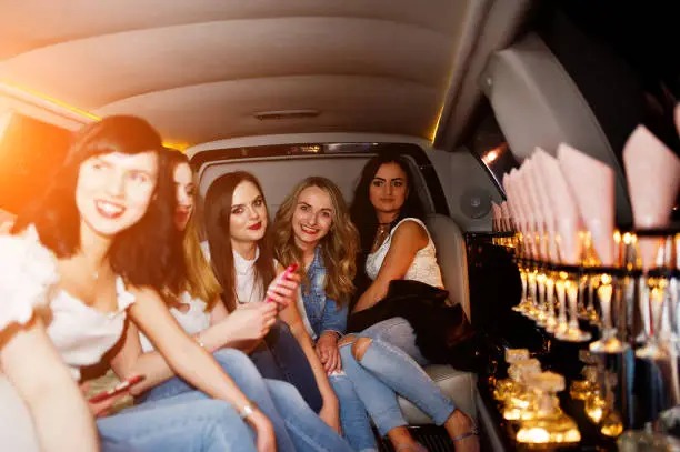 Luxury limousine service by www.transportlinkhub.pro showcasing satisfied customers enjoying memorable experiences.