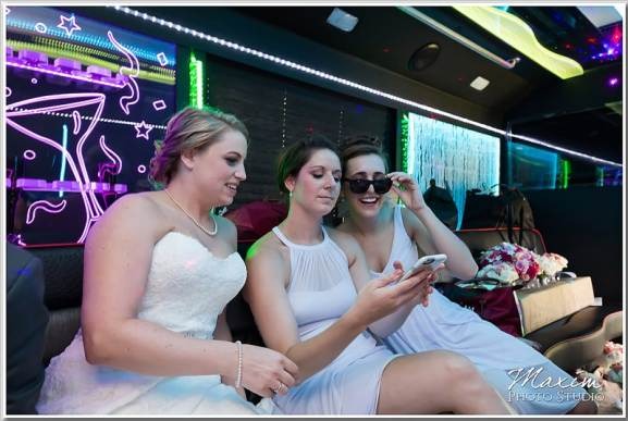 Happy customers enjoying luxury limousine service from www.transportlinkhub.pro during a memorable event.